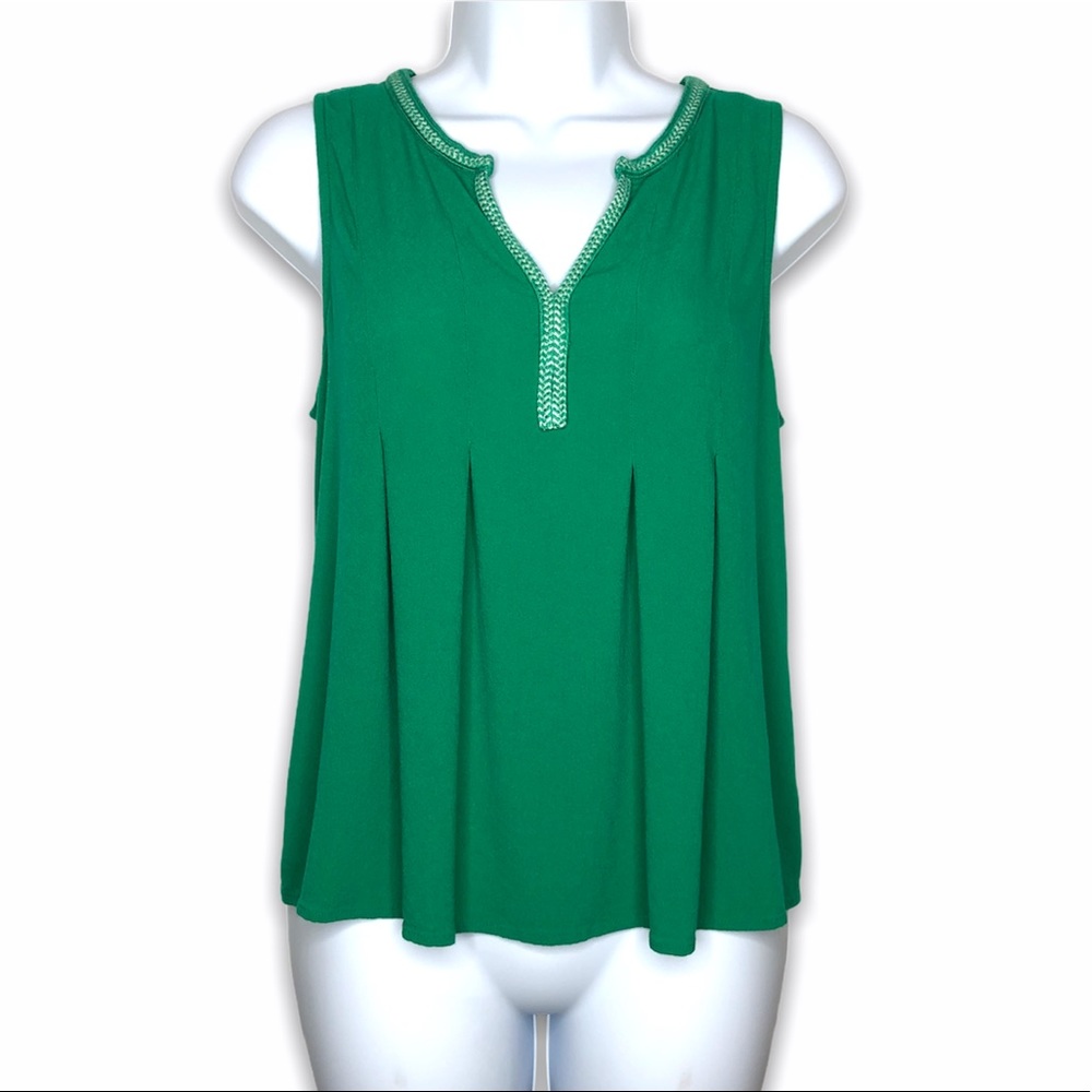 Skies are blue tank top green notch neck